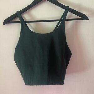 Girlfriend Collective dark green sports bra.